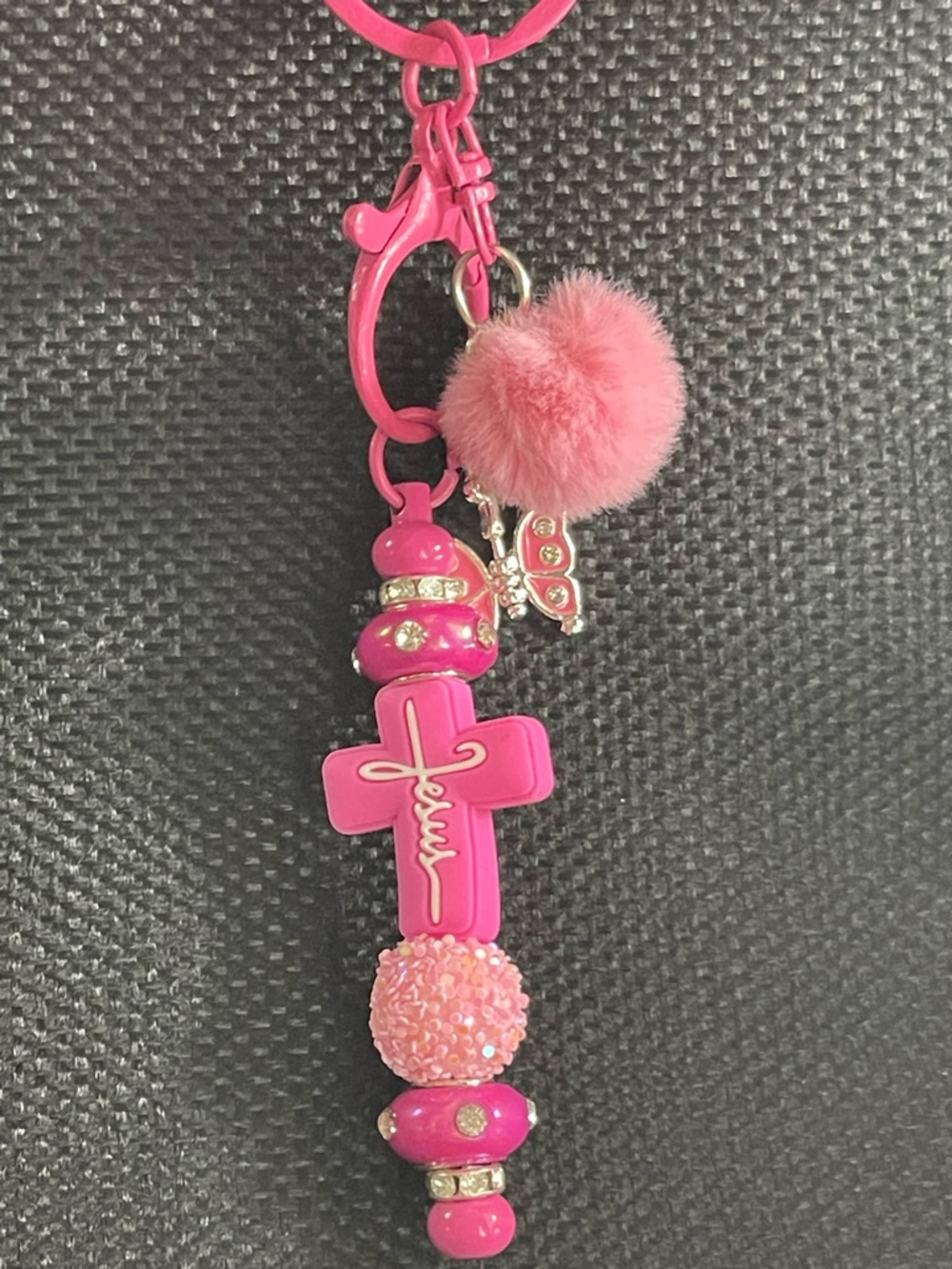 Pink Cross Charm Keychain Necklace with Pom Pom and Butterfly Accent
